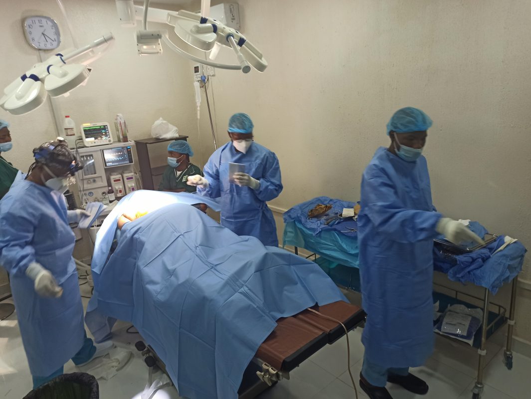 surgeons using surgical disposables during a surgery
